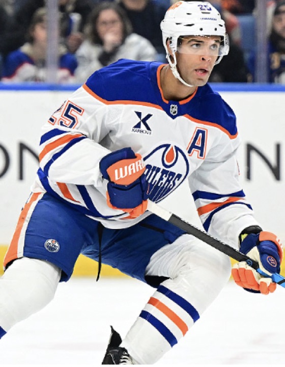 Darnell Nurse in an Edmonton Oilers jersey, number 25, wearing an alternate captain's A